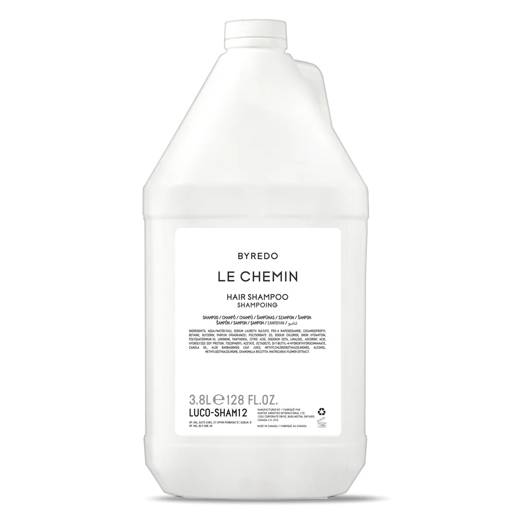 Byredo Le Chemin Hair & Body Collection – 3 Piece Refill Set shampoo in a sleek white bottle for an elevated routine.