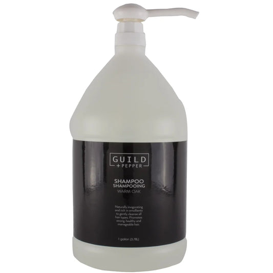 Guild+Pepper 1-gallon shampoo with pump, featuring warm oak scent and modern design.