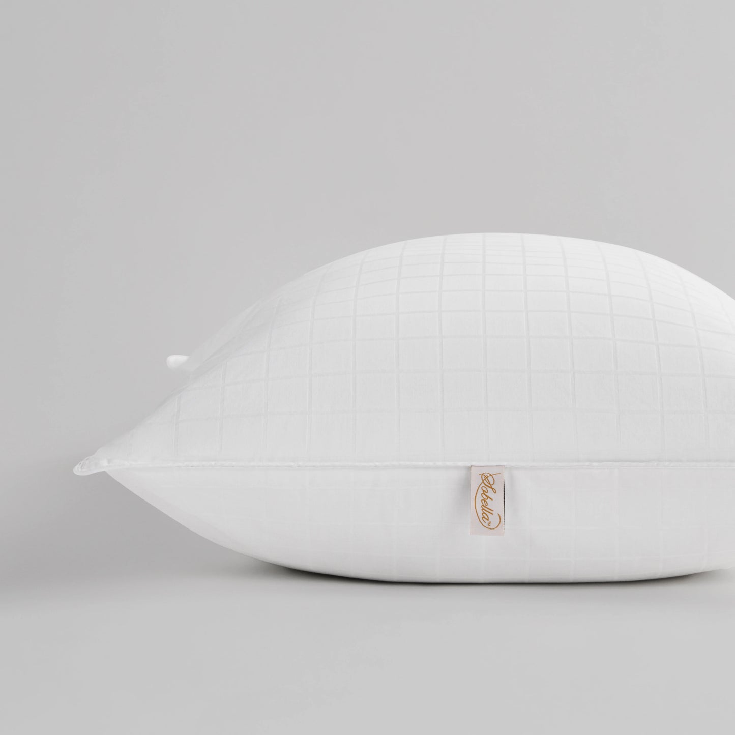 SOBELLA hypoallergenic pillow featuring a soft gel fiber fill and chic geometric box pattern in a 100% cotton cover.