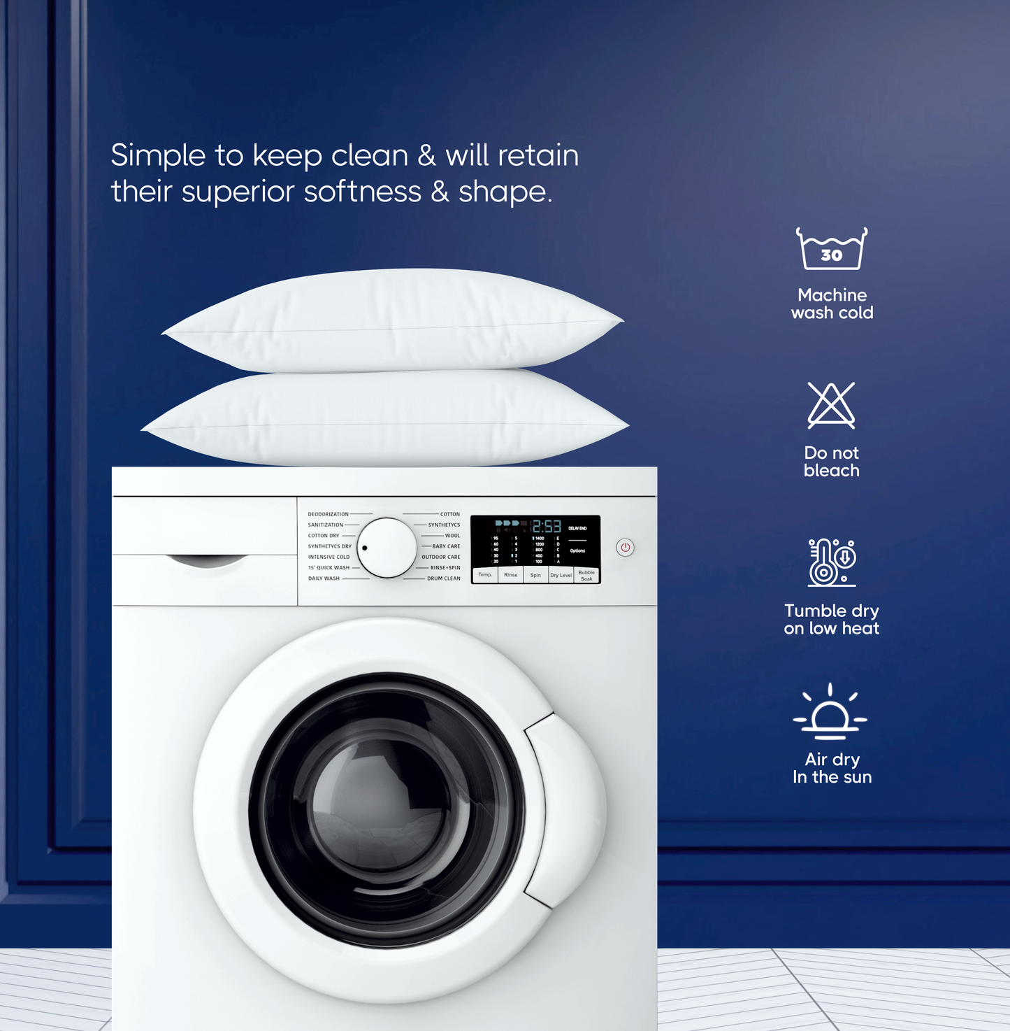 Washing machine with two king pillows on top, highlighting easy care instructions for maintaining softness.