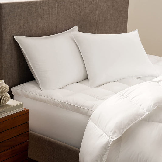 Down Dreams Duck Feather Pillow set on a stylish bed, featuring soft, all-natural materials for comfort and support.