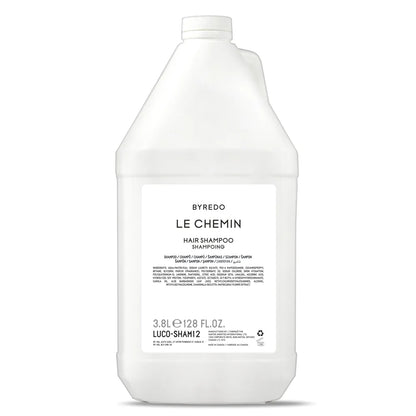 Byredo Le Chemin Hair & Body Collection – 3 Piece Refill Set shampoo in a sleek white bottle for an elevated routine.