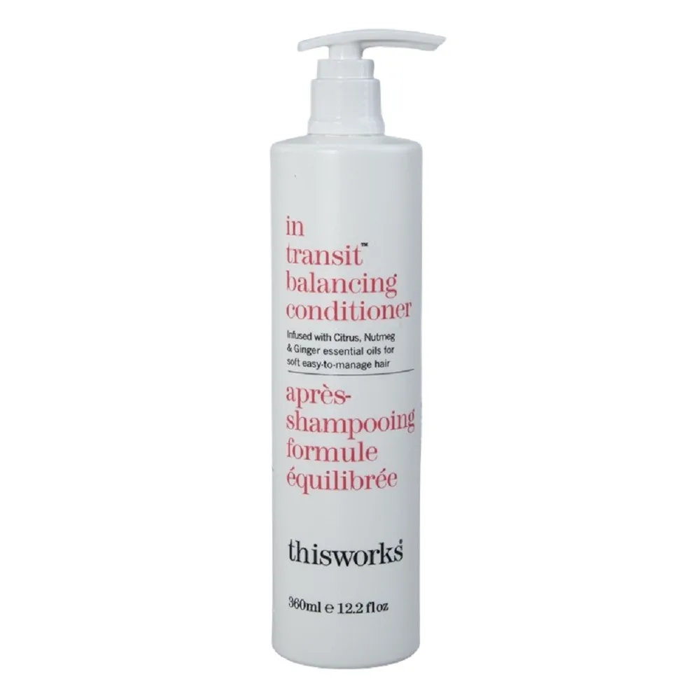 THISWORKS IN TRANSIT BALANCING CONDITIONER bottle with a pump, infused with citrus and ginger essential oils.