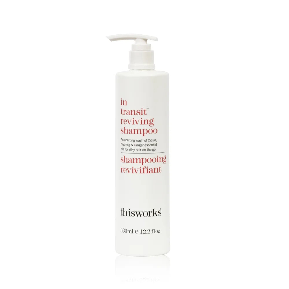 THISWORKS IN TRANSIT REVIVING SHAMPOO bottle for restorative everyday hair care, 300ml.