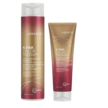 Joico K-PAK Color Therapy duo with a 10.1 oz color-protecting shampoo bottle and an 8.5 oz color-protecting conditioner tube in gold and magenta packaging.