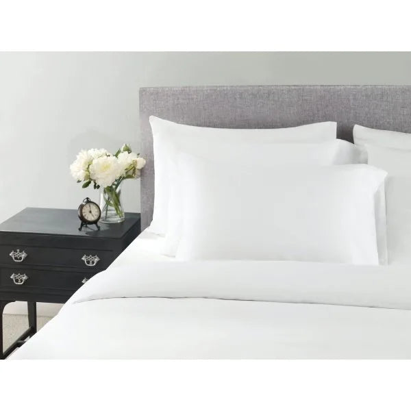 WynRest King Microfiber Pillowcase Set of 2 — crisp white hotel-quality pillowcases on a luxury bed as found in Wyndham Hotels


