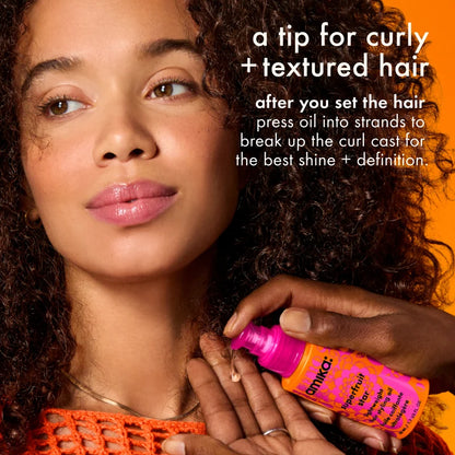 curly hair styling tip: press amika superfruit star oil into strands to soften the curl cast
