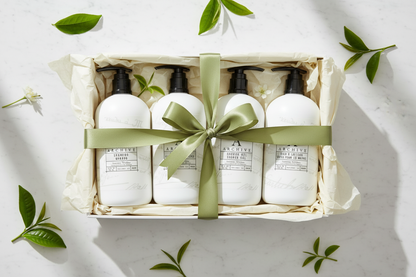Archive Green Tea & Willow luxury hotel bath set in a gift box with ribbon and natural foliage.