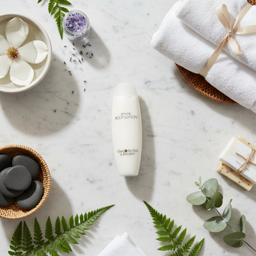 Omni Resort Body Lotion Travel Size - luxury hotel body lotion on marble flat lay with spa elements