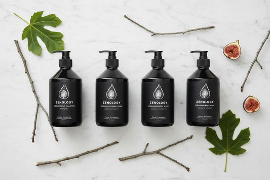 Zenology 4-piece luxury hair and body care set sycamore fig botanicals on white marble as found in Hotel Indigo