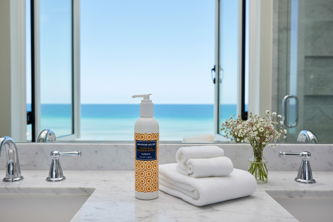 Jonathan Adler Citrus & Sandalwood Shampoo flat lay with citrus and sandalwood scent elements