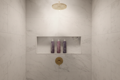 Kevin Murphy Young.Again 3-piece hair and body care set in luxury hotel shower niche — restorative shampoo conditioner body wash