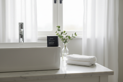 Sodashi Botanical Cleansing Bar on ceramic sink edge with eucalyptus