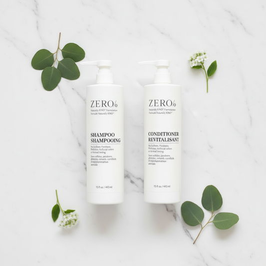 Zero % Naturally Kind Shampoo and Conditioner matching duo — sulfate-free paraben-free clean hair care set with matching bottles displayed on white marble with botanical accents